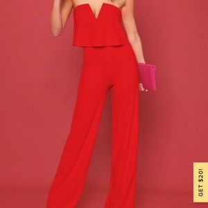 Worn once. Red jumpsuit. Gorgeous fit! True to size